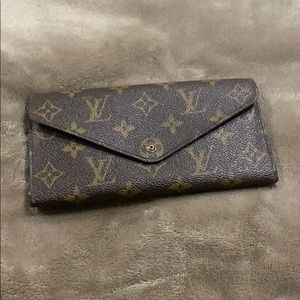 Louis Vuitton “Emilie” wallet